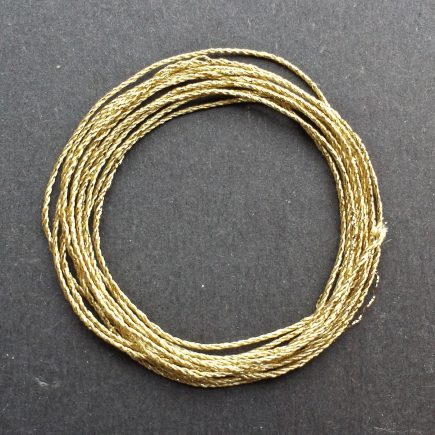 A coil of 3-ply gold lamé.