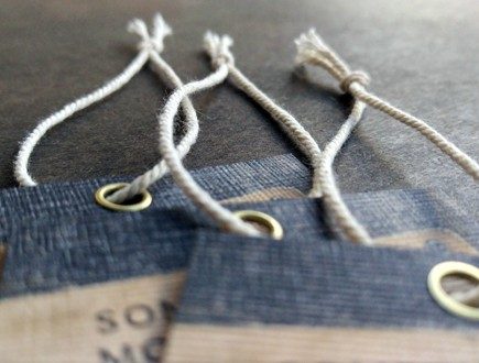 Eyeletted tags strung with Cotton Rope Cord.