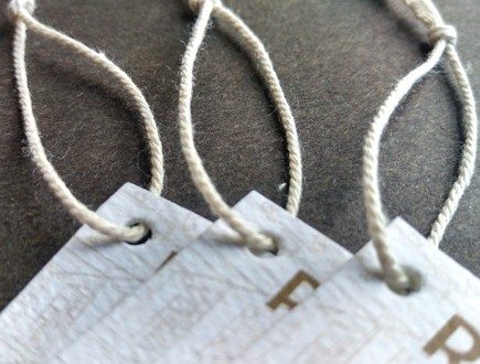 Folded tags strung with Cotton Rope Cord.