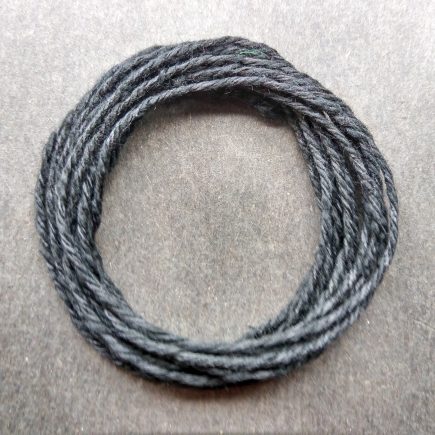 Coil of our heavyweight black cotton string.