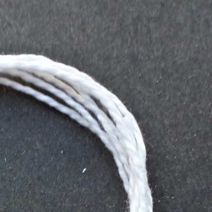Close-up photograph of lightweight 5/2 mercerized cotton in white.
