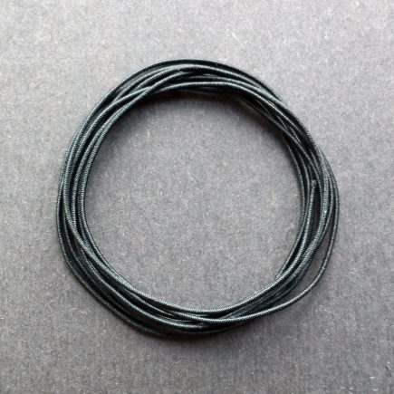A coil of our black non-fray elastic.