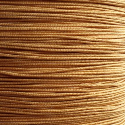 A spool of our gold non-fray elastic.