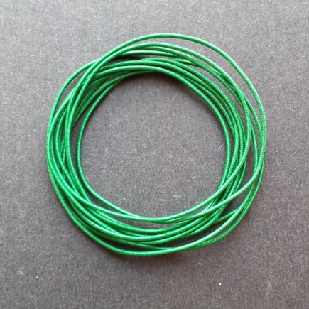 A coil of our green non-fray elastic.
