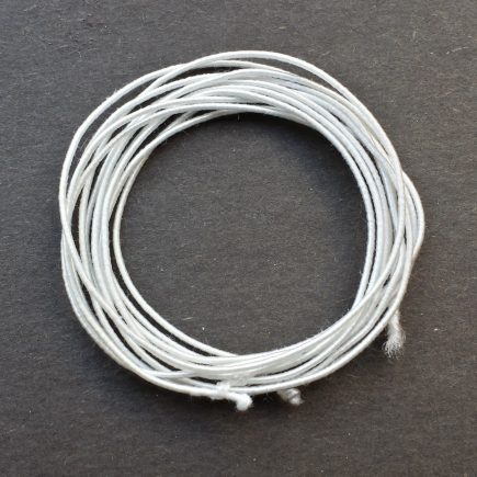 A coil of our standard elastic in white.
